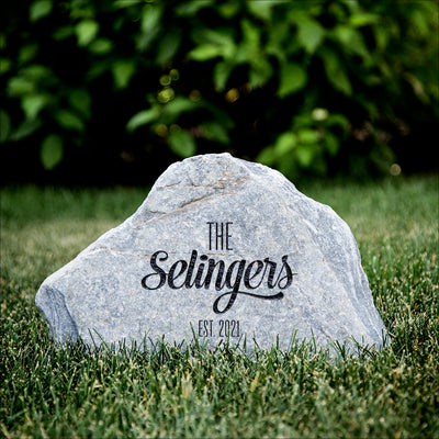 This Ocean Pearl Flagstone is deep etched with family name and established year using the sandblasting technique.  Each stone is unique in shape and size.  It is light grey in color and the letters are color filled with black.